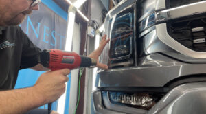 Final touches of protection installation layer with a heat gun